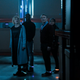 The Doctor and friends, complete with tracking devices, get a tour of their new workspace.